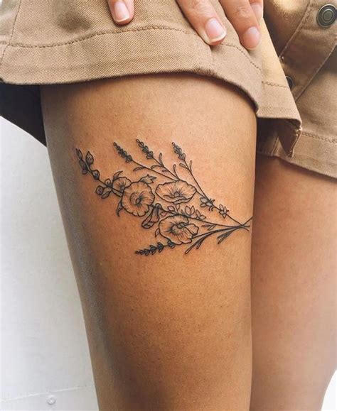 51 Sexy Thigh Tattoos For Women + Cute Designs and Ideas。